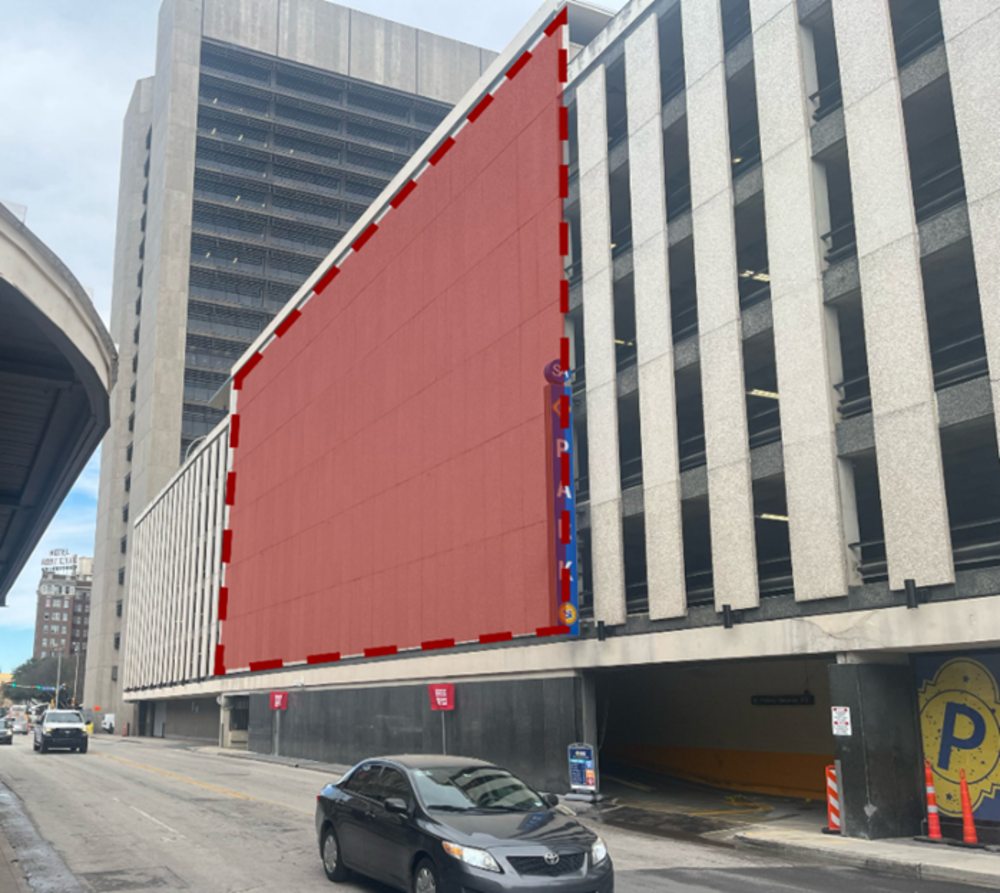 This photo shows the City Tower Flores St. public art project location from Street view. There is a red square highlighting the mural location.