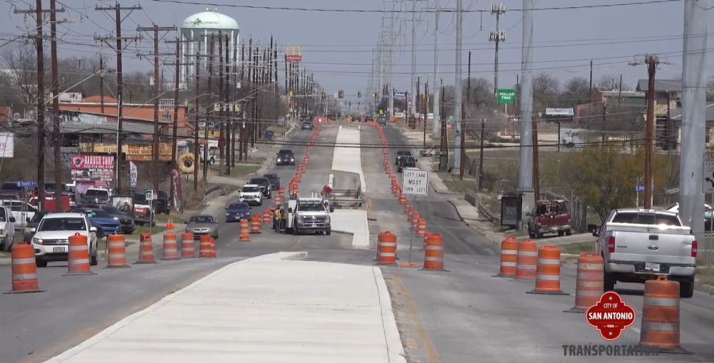 pleasanton road construction shows construction barrels, vehicle traffic and the large concrete median being installed