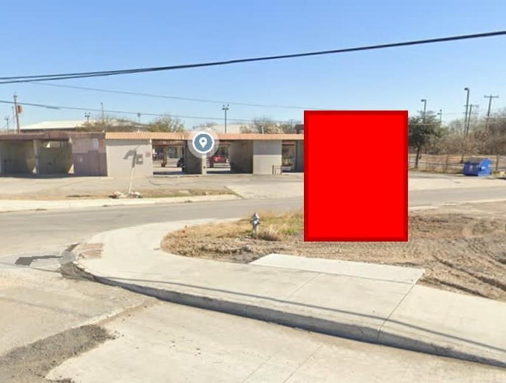 This photo shows the Old Highway 90 Project location from Street view. There is a red square showing the sculpture location. 
